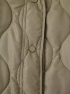 Women’s Quilted Jacket with Round Neck and Button Front